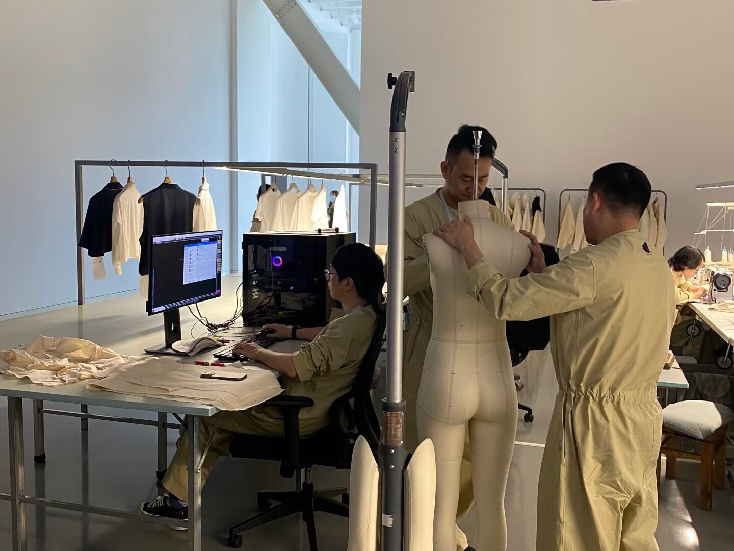 fashion designer working on clothing tech pack