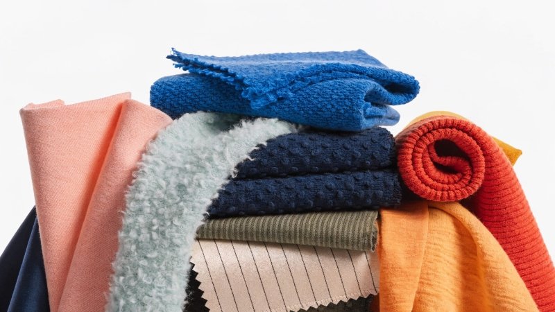 A collection of colorful fabric swatches for clothing brands