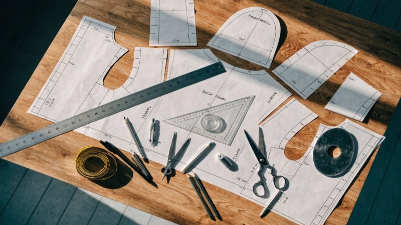 Hoodie Paper Pattern A paper pattern for a hoodie laid out on a table