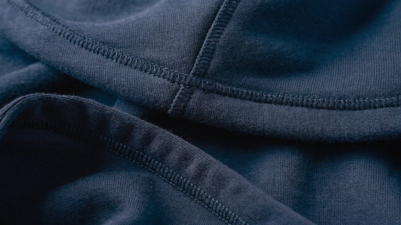 Hoodie Stitching and Construction A detailed shot of clean, strong double-needle stitching on a hoodie seam